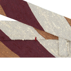 Anversa hand-finished silk tie. Striped cream, burgundy, orange.