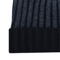 Cashmere ribbed hat with salt treatment. Dark Blu