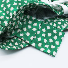 Green swimwear with shells. Quick-drying and multi- pockets